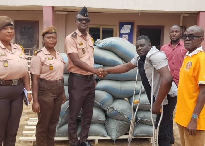 Physically challenged agro-processor donates bags of corn grits to Sunyani Central Prisons